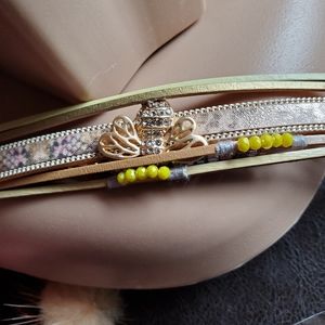 This is such a unique bracelet  With a gold bee